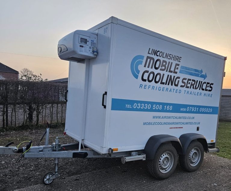 Lincolnshire Mobile Cooling Services Trailer Mobile cooling services trailer with LCMS branding, parked outdoors during sunset.